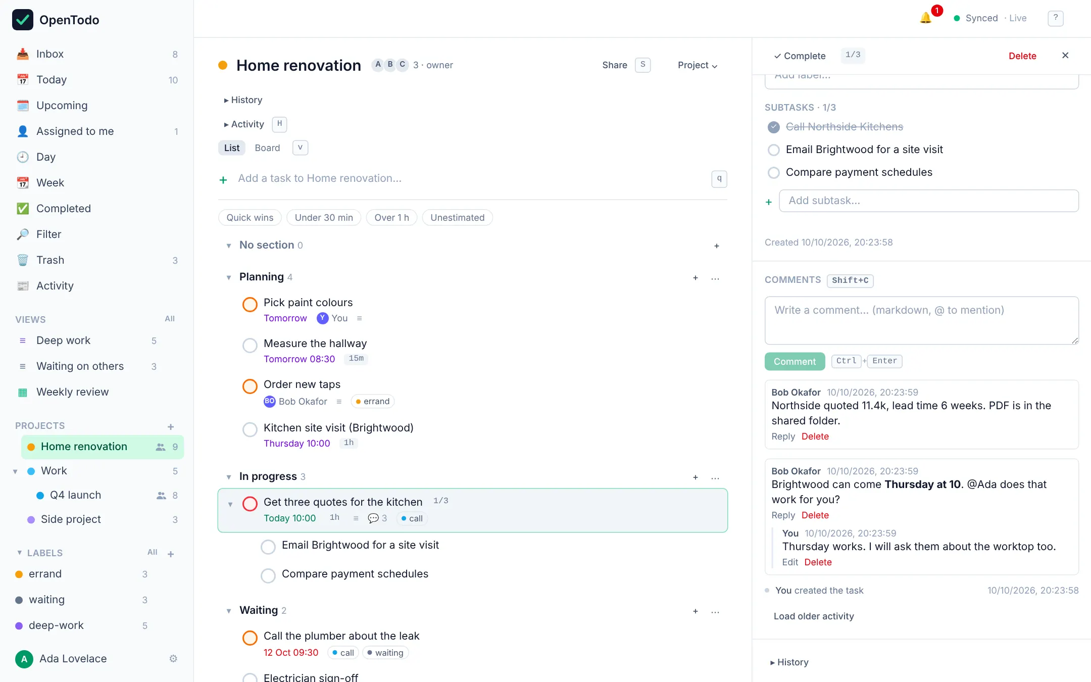 A shared project with three member avatars and a task detail panel showing subtasks and a threaded comment discussion, including an @mention and a reply.